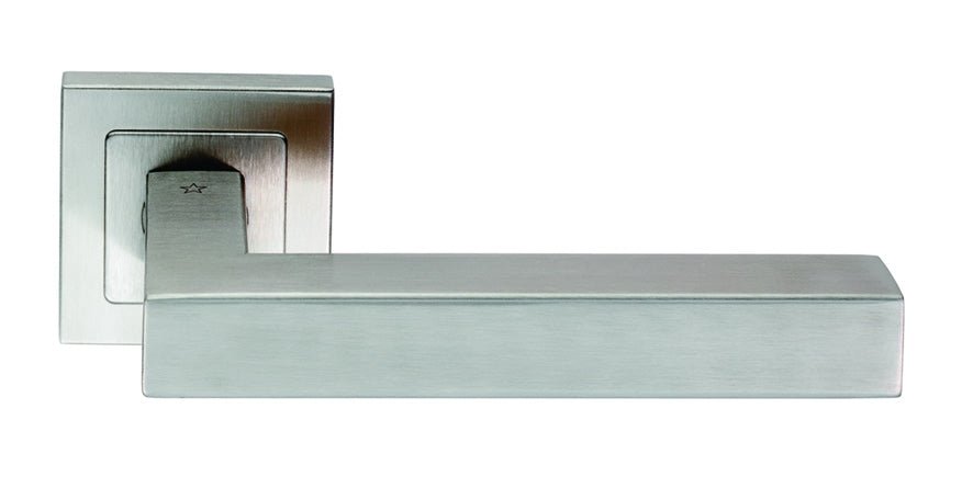 Carlisle Brass Alvar Designer Lever on Sprung Square Rose in a brushed stainless steel finish. The lever features a geometric square design with a flat handle and matching square rose plate.