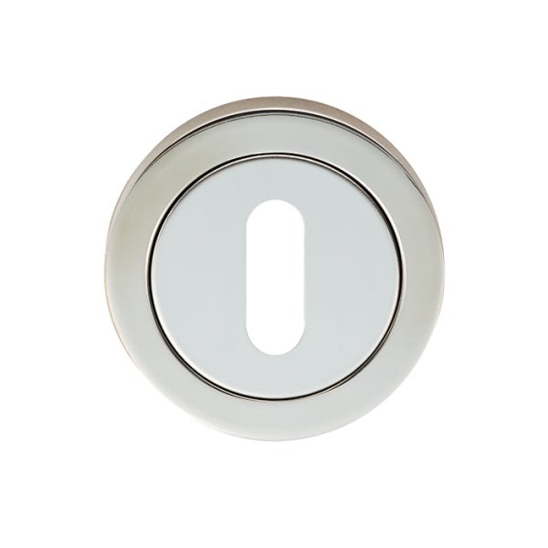 Carlisle Brass SWL Escutcheon - Standard Profile in a polished chrome finish, featuring a circular design with an oval keyhole opening in the center.