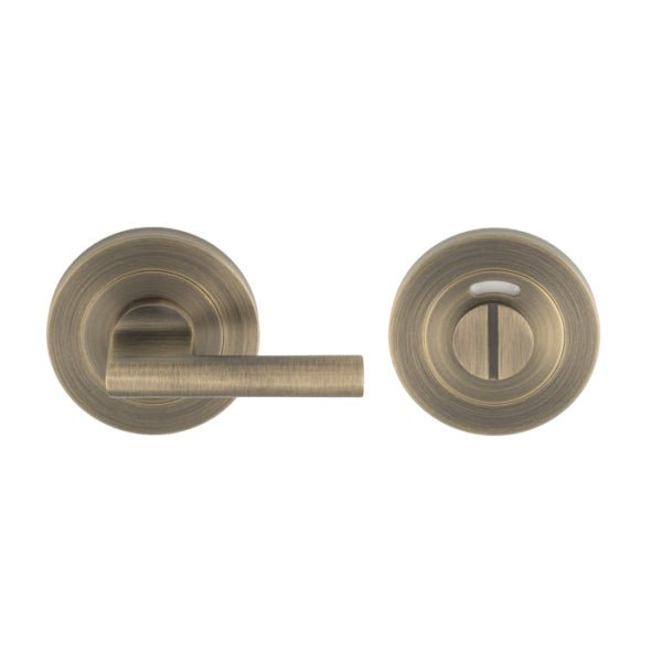 Carlisle Brass SWL Disabled Thumbturn in a brushed antique brass finish features a round backplate and a simple lever handle for easy access.