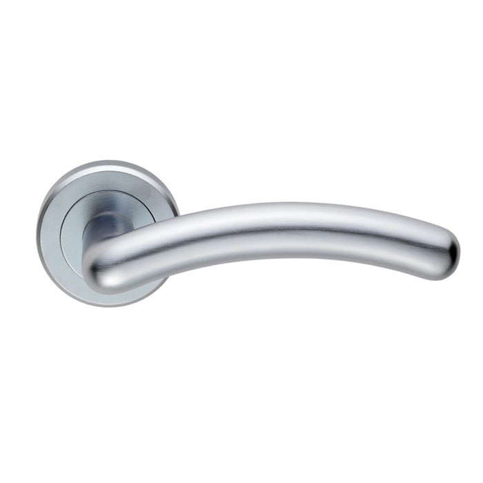 Carlisle Brass Noxia Lever On Rose in polished chrome finish, featuring a curved lever design mounted on a round rose plate.