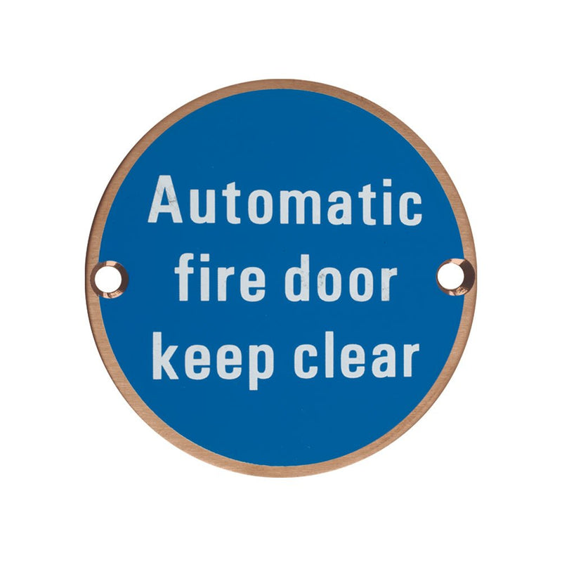 Zoo Hardware Automatic Fire Door Keep Clear Sign in circular shape, featuring a blue background with white text, clearly stating 'Automatic fire door keep clear'.