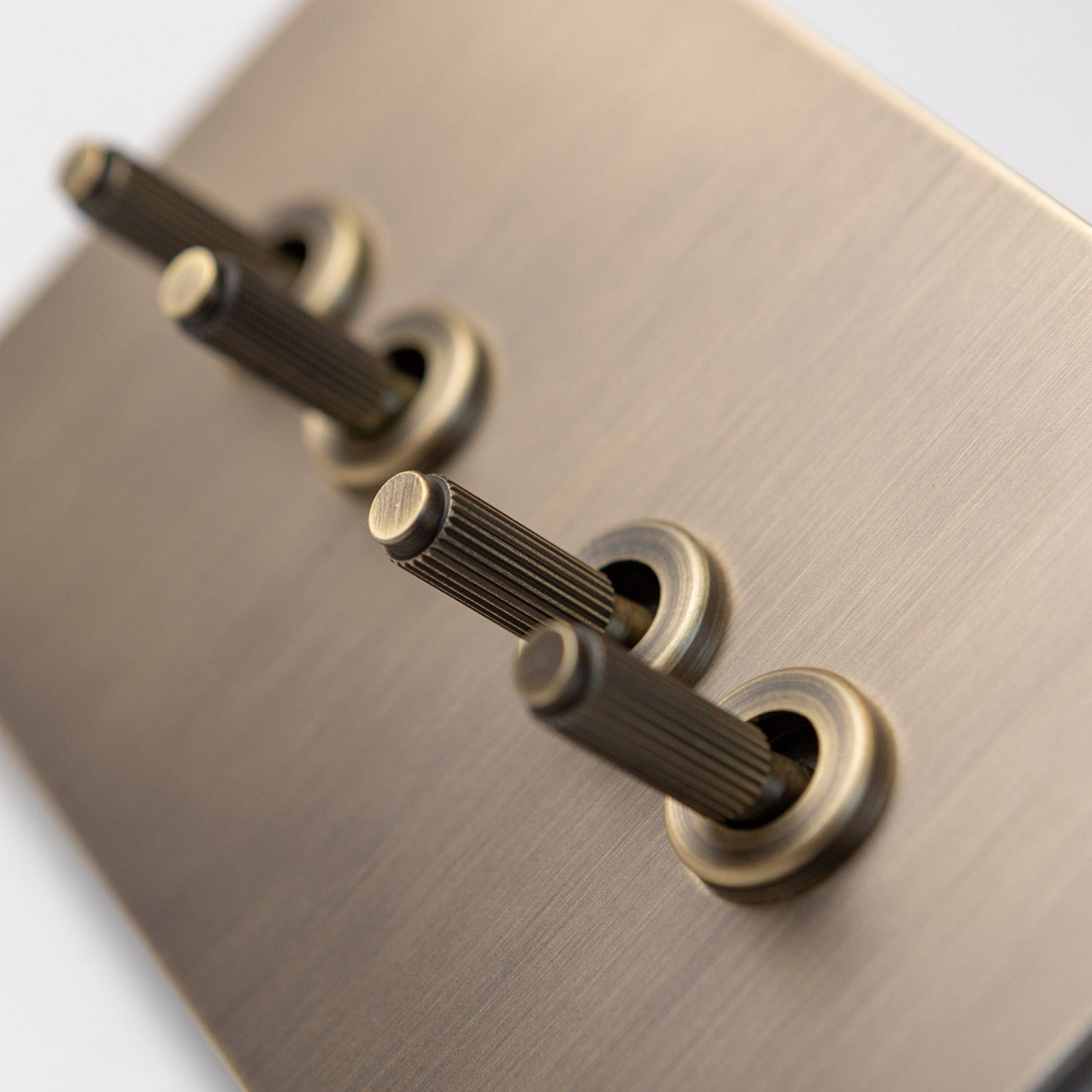Antique Brass Switches and Sockets - Straight Knurled Design