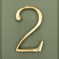 Brass bee Premium Floating Plain House Number '2' in polished brass finish, featuring a curved and sleek design for visibility and style.