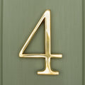 Brass bee Premium Floating Plain House Numbers in polished brass finish, featuring the number 4, with a sleek design and reflective surface, suitable for various exterior applications.