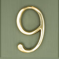 Brass bee Premium Floating Plain House Number in polished brass finish, showing the numeral '9' with a sleek, modern design that enhances visibility and style.