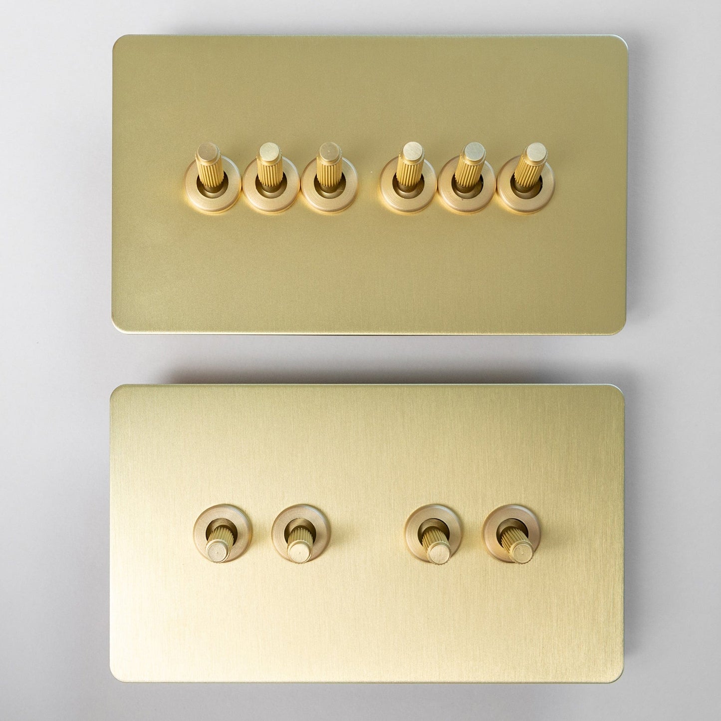 Satin Brass Switches and Sockets - Straight Knurled Design