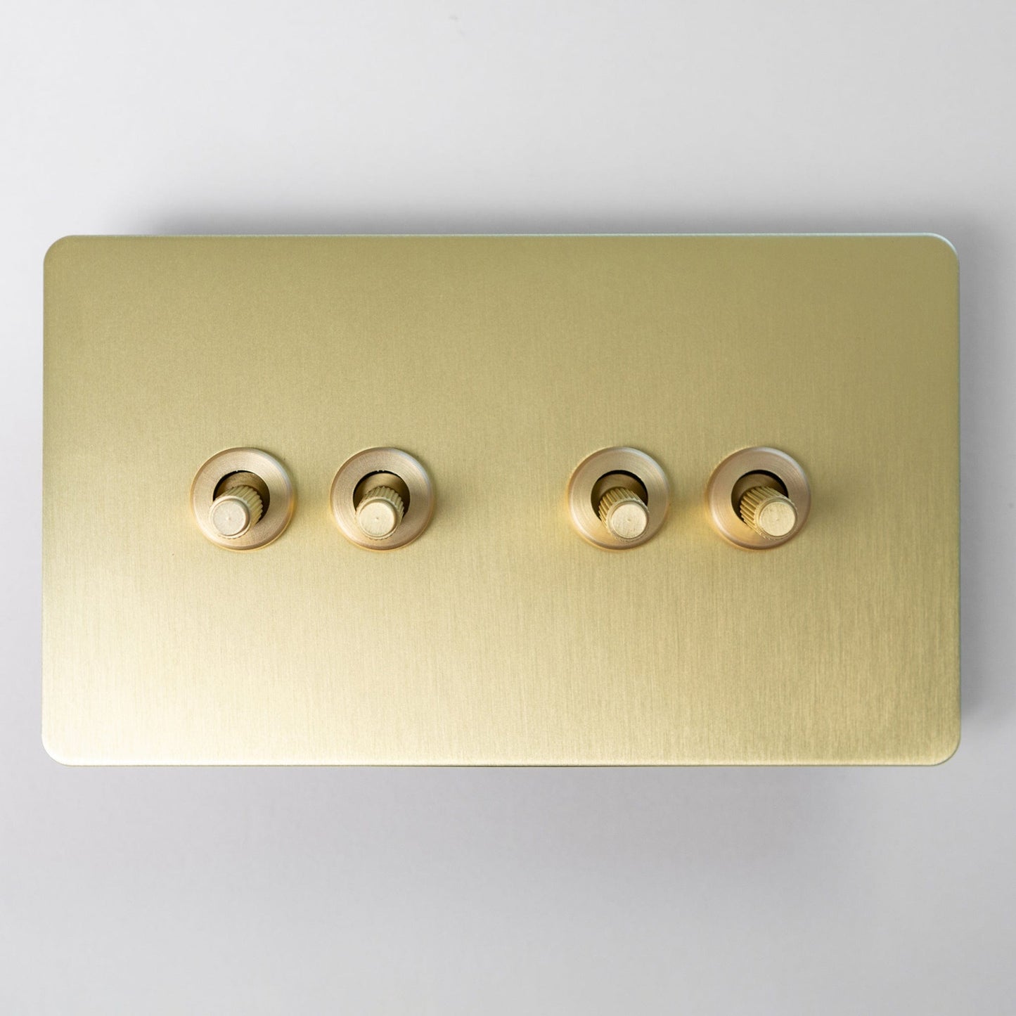 Satin Brass Switches and Sockets - Straight Knurled Design
