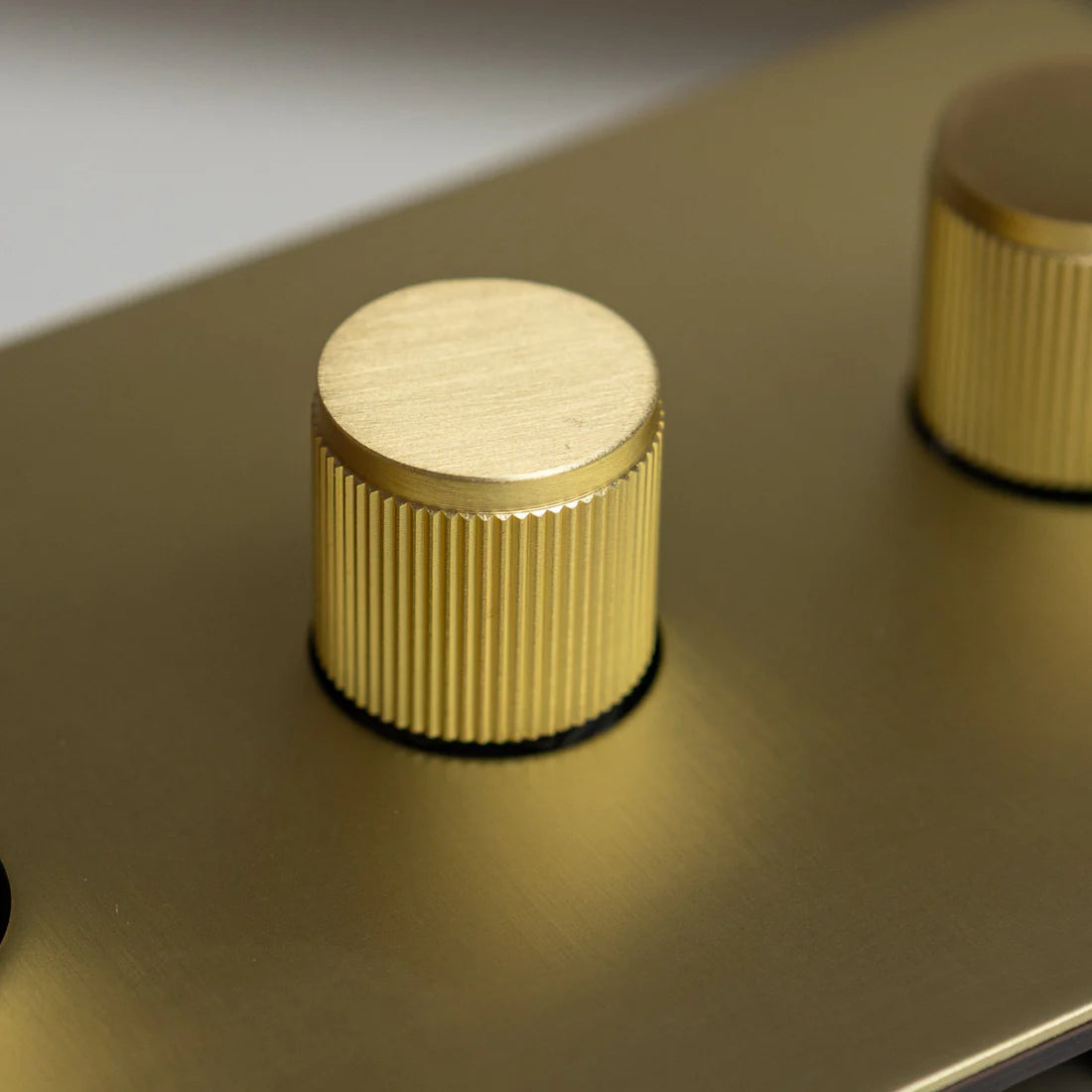 Satin Brass Switches and Sockets - Straight Knurled Design