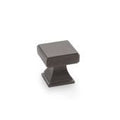 Alexander & Wilks Jesper Square Cupboard Knob in a dark bronze finish, featuring a square top and a tapered base for a classic look.