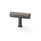 Alexander & Wilks Crispin Knurled T-Bar Cupboard Knob in a dark metallic finish, featuring a textured knurled surface for grip and a cylindrical shape, designed for cupboard doors.