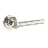 Alexander & Wilks Siskin Lever on Rose in a polished finish, featuring a sleek lever design mounted on a round rose plate, suitable for interior doors.