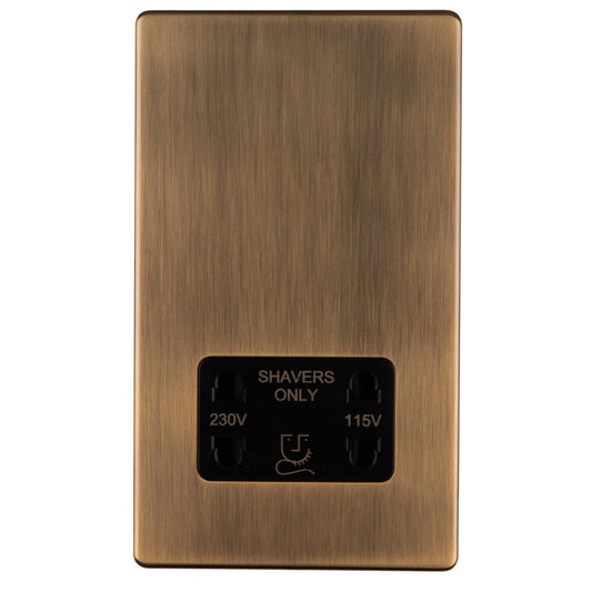 Eurolite Concealed 3mm Shaver Socket in antique brass, featuring a brushed metal finish with a black panel indicating voltage ratings of 230V and 115V.