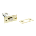 Atlantic Tubular Deadbolt – 2.5", 3" & 4" in a polished brass finish, featuring a cylindrical locking mechanism and a matching strike plate for secure door installation.