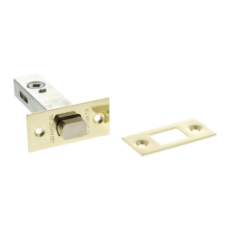 Atlantic Tubular Deadbolt in brass finish, measuring 2.5 inches, includes a cylindrical locking mechanism and a matching strike plate. The deadbolt features a polished look with a simple rectangular design.