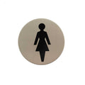 Atlantic Comercial Hardware restroom sign in brushed stainless steel, featuring a black silhouette of a female figure on a round plaque.