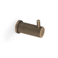 Alexander & Wilks Brunel Reeded Coat Hook in a warm bronze finish, featuring vertical ribbing and a round base, designed for wall mounting.