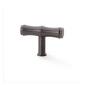 Alexander & Wilks Crispin Bamboo T-Bar Cupboard Knob in a dark metallic finish, featuring a smooth T-shaped design and a cylindrical base for mounting.