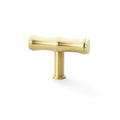 Alexander & Wilks Crispin Bamboo T-Bar Cupboard Knob in a brushed brass finish, featuring a T-bar shape with cylindrical ends for a modern touch.