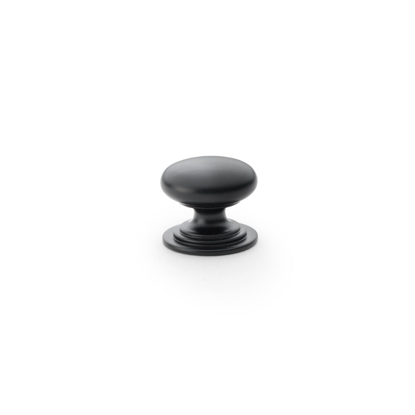 Alexander & Wilks Waltz Round Cupboard Knob on Stepped Rose in a matte black finish, featuring a rounded design with a stepped base for cabinet doors or drawers.