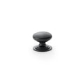 Alexander & Wilks Waltz Round Cupboard Knob on Stepped Rose in a matte black finish, featuring a rounded design with a stepped base for cabinet doors or drawers.