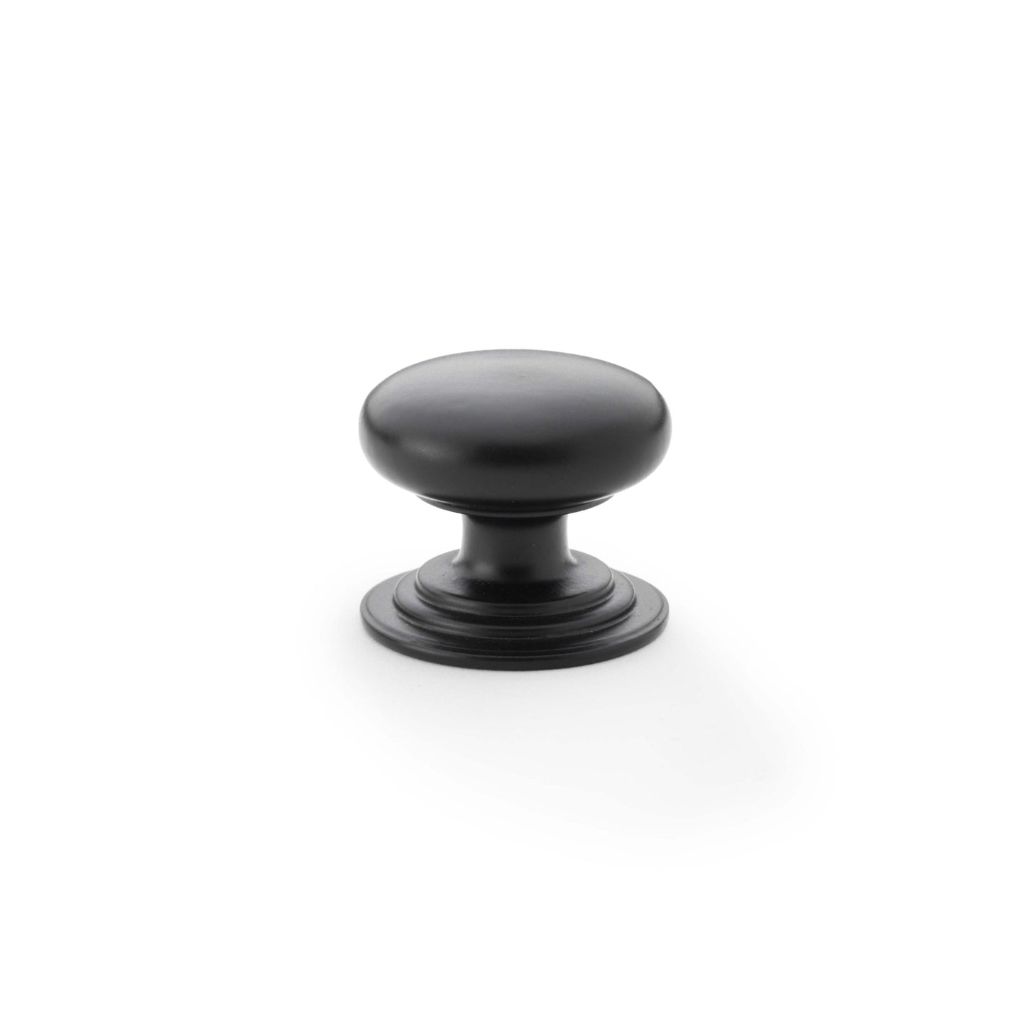 Alexander & Wilks Waltz Round Cupboard Knob on Stepped Rose in a matte black finish, featuring a rounded top and a stepped base for secure mounting.
