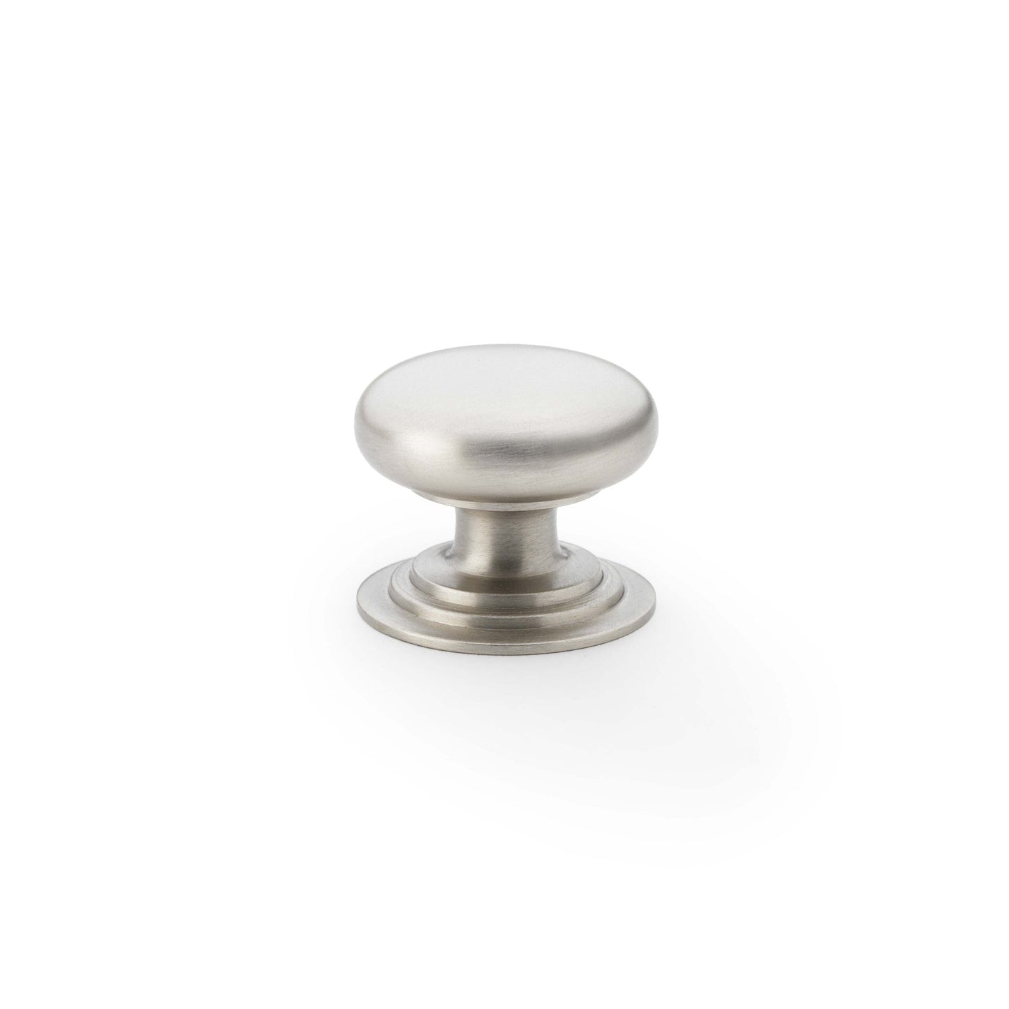 Alexander & Wilks Waltz Round Cupboard Knob on Stepped Rose in brushed nickel finish, featuring a rounded knob design with a stepped base for easy grip.