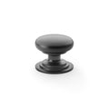 Alexander & Wilks Waltz Round Cupboard Knob on Stepped Rose in a sleek black finish, featuring a rounded knob with a stepped base design.