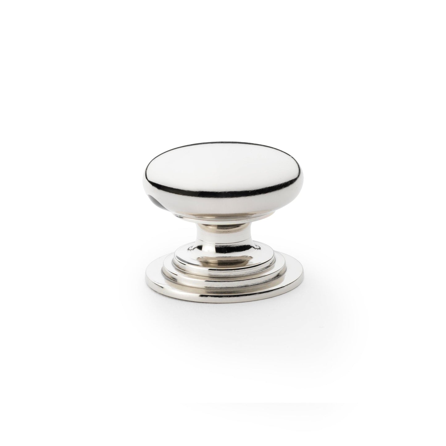 Alexander & Wilks Waltz Round Cupboard Knob on Stepped Rose in polished chrome finish, featuring a smooth round design and stepped base for installation.