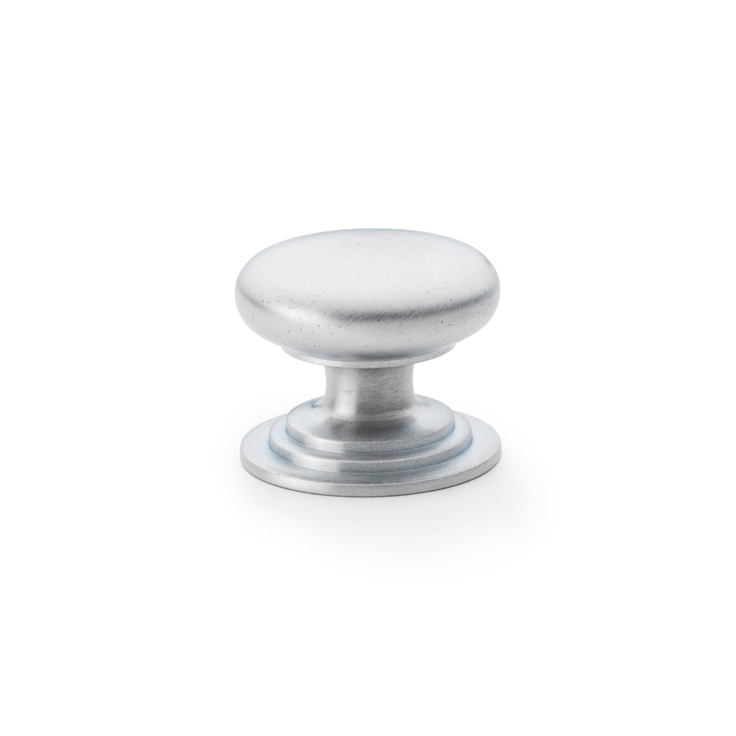 Alexander & Wilks Waltz Round Cupboard Knob on Stepped Rose in a silver finish, featuring a smooth round dome shape and a stepped base for secure installation.