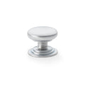 Alexander & Wilks Waltz Round Cupboard Knob on Stepped Rose in a silver finish, featuring a smooth round dome shape and a stepped base for secure installation.