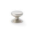 Alexander & Wilks Waltz Round Cupboard Knob on Stepped Rose with a brushed nickel finish, featuring a smooth, rounded top and stepped base for easy grip.
