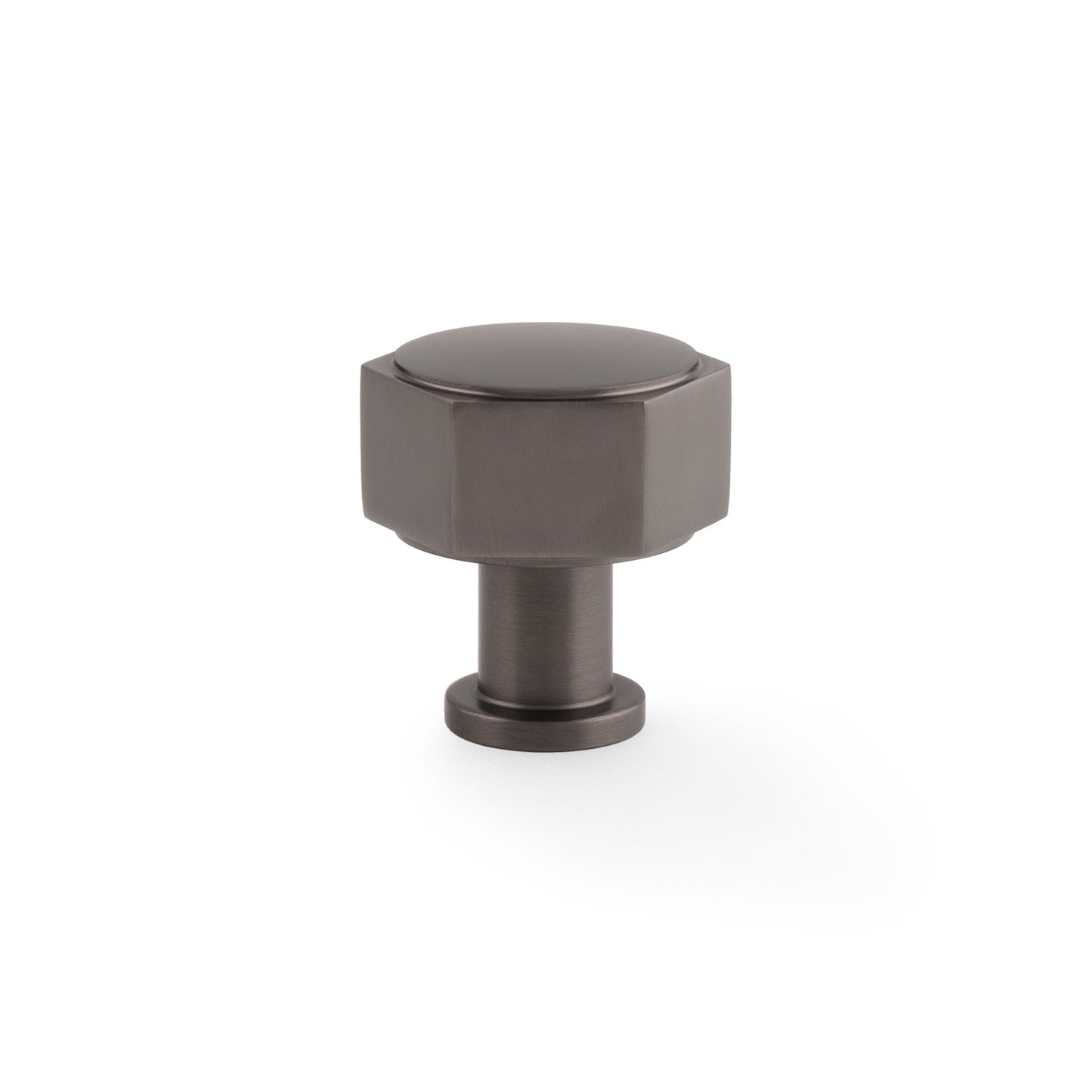 Alexander & Wilks Vesper Hex Cabinet Knob in a dark bronze finish with a hexagonal design and a cylindrical base for mounting.