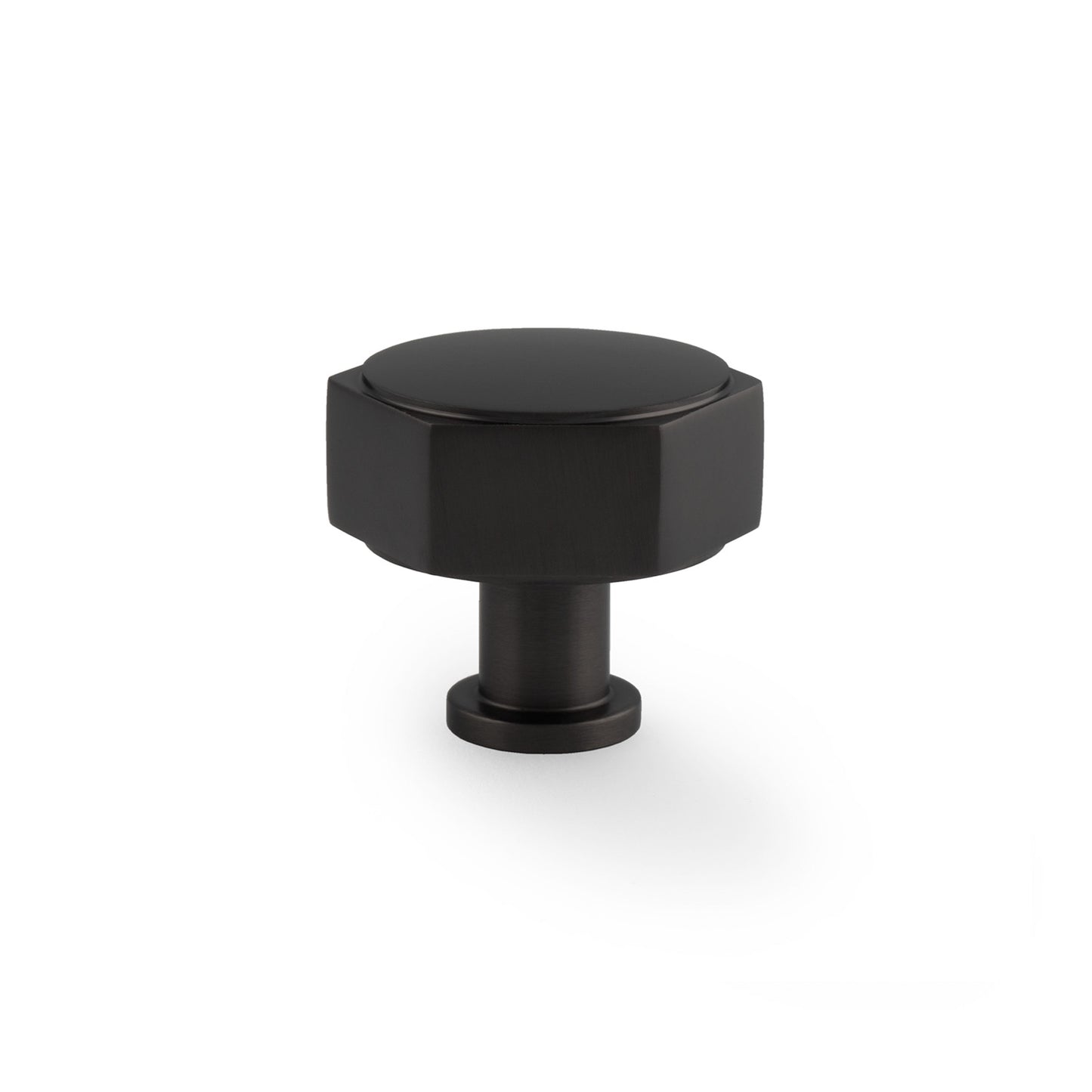 Alexander & Wilks Vesper Hex Cabinet Knob in a matte black finish, featuring a hexagonal shape and a sturdy base for easy grip.