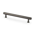 Alexander & Wilks Vesper Hex T-Bar Cabinet Pull in a brushed bronze finish, featuring a sleek, elongated design with two cylindrical mounting posts for secure installation.