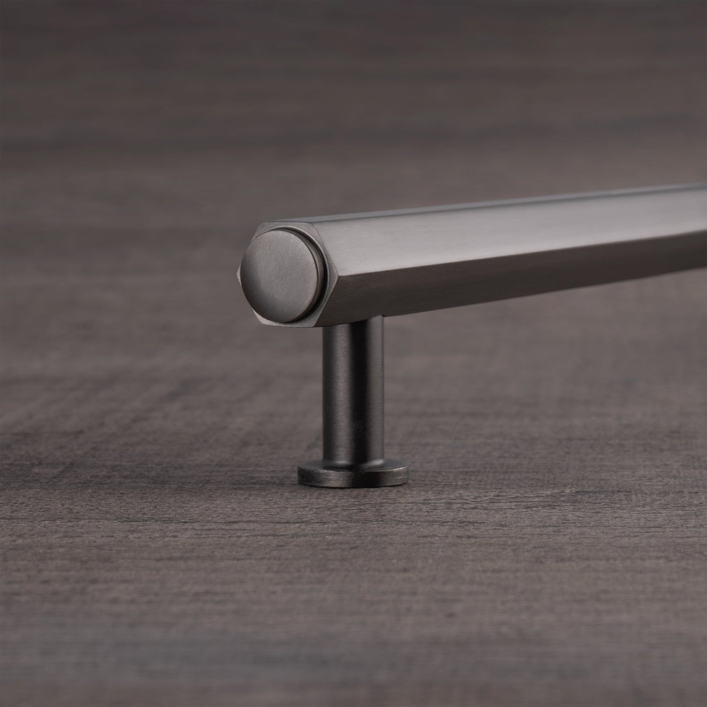 Alexander & Wilks Vesper Hex T-Bar Cabinet Pull in a sleek metal finish, featuring a horizontal bar shape with rounded end caps and a center support, designed for modern cabinetry.