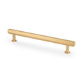 Alexander & Wilks Vesper Hex T-Bar Cabinet Pull in a brushed gold finish, featuring a smooth cylindrical shape with two mounting posts for easy installation.