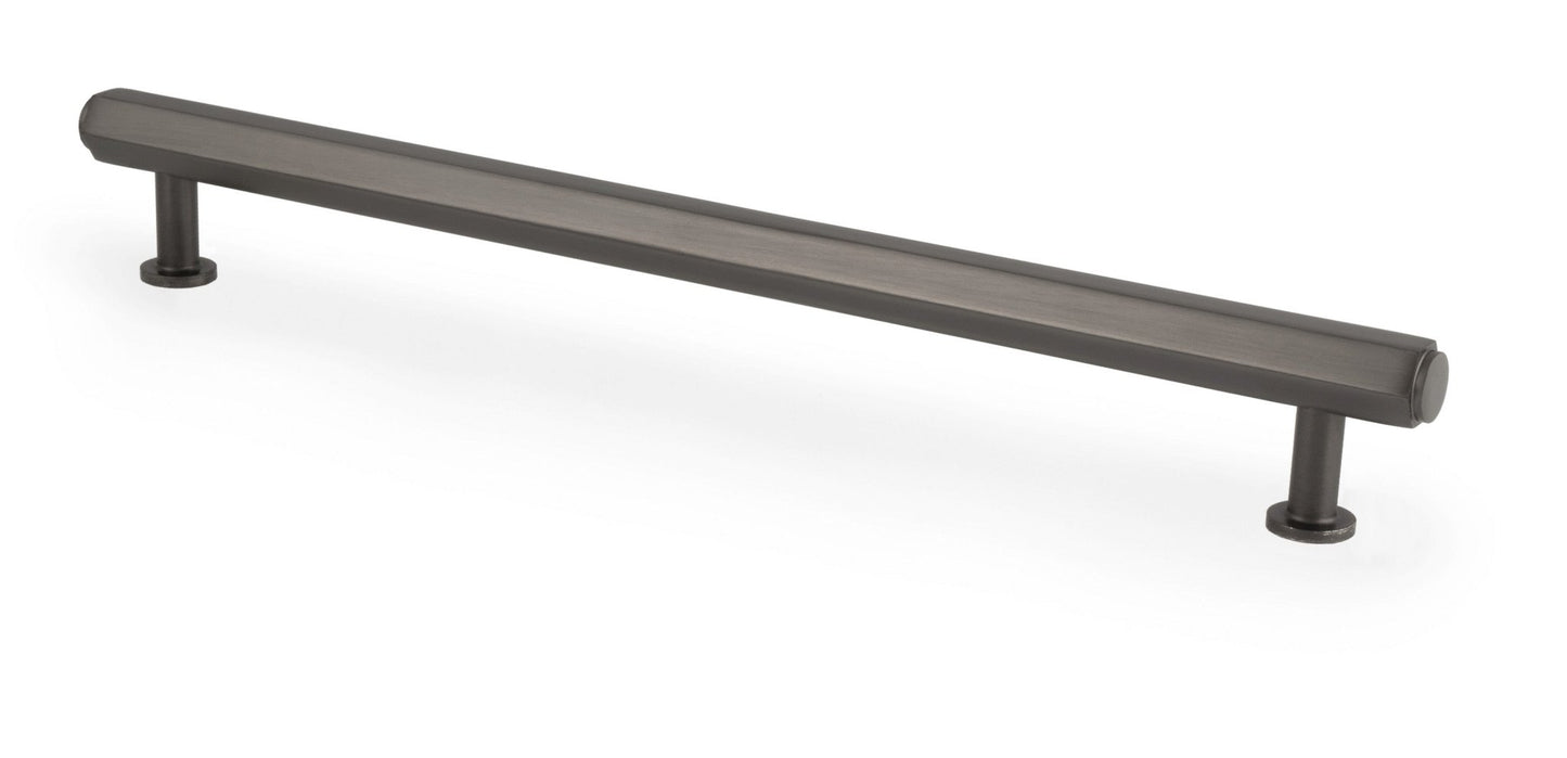 Alexander & Wilks Vesper Hex T-Bar Cabinet Pull in a dark finish, featuring a long, straight bar design with two cylindrical mounts on each end for easy installation.