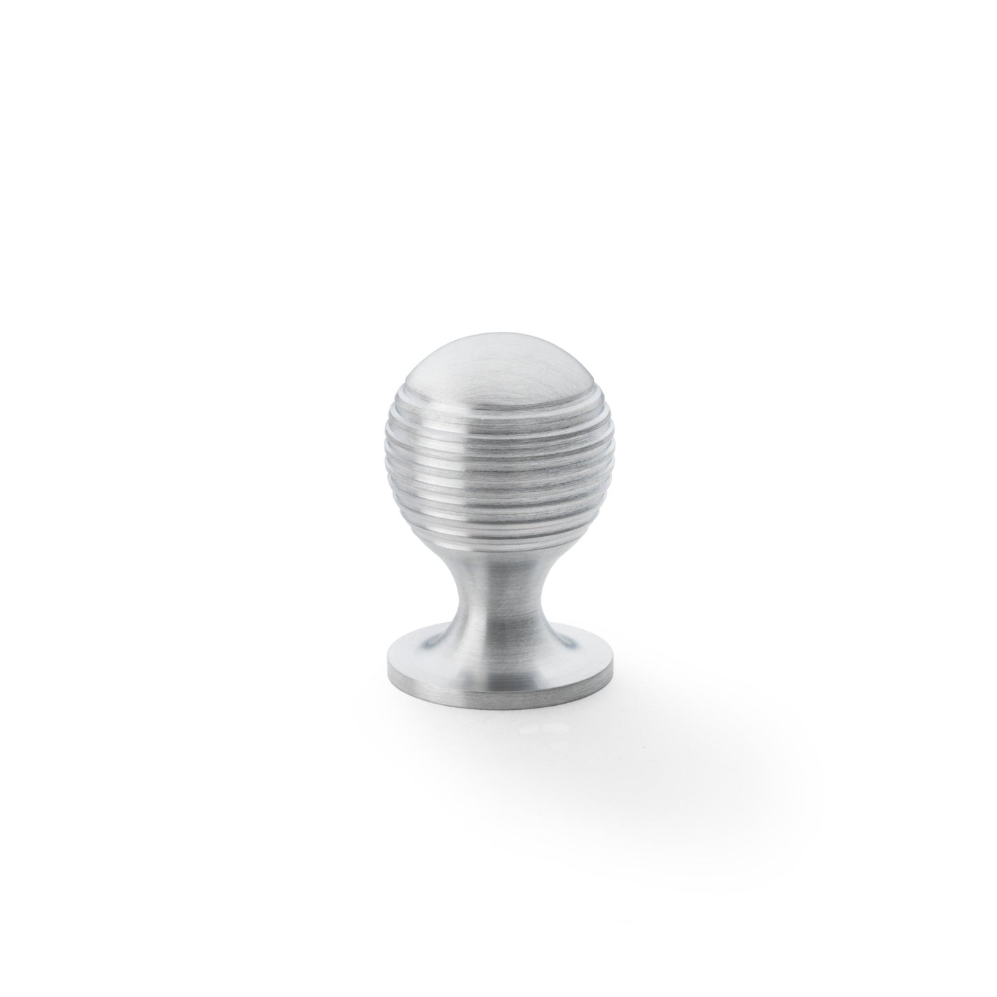 Alexander & Wilks Caesar Cupboard Knob on Round Rose in stainless steel, featuring a round, ribbed design and a sturdy base, providing a sleek and modern look for cabinetry.