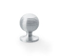 Alexander & Wilks Caesar Cupboard Knob on Round Rose in brushed aluminum finish, featuring a spherical shape with horizontal grooves and a circular base for installation.
