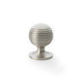 Alexander & Wilks Caesar Cupboard Knob on Round Rose in a brushed nickel finish, featuring a round shape with vertical grooves and a sturdy base for easy installation.