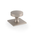 Alexander & Wilks Bullion Cupboard Knob on Square Backplate is finished in brushed nickel, featuring a round knob design mounted on a square backplate for a modern look.