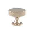 Alexander & Wilks Berlin Knurled Cupboard Knob in a brushed nickel finish, featuring a round top with a knurled texture and a tapered base, designed for cabinets or drawers.