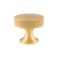Alexander & Wilks Berlin Knurled Cupboard Knob in a brushed gold finish, featuring a knurled texture and a round shape, supported by a tapered base for easy grip.