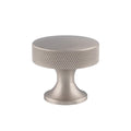 Alexander & Wilks Berlin Knurled Cupboard Knob in a brushed nickel finish, featuring a round top with a knurled texture and a sturdy base, designed for cabinets and drawers.