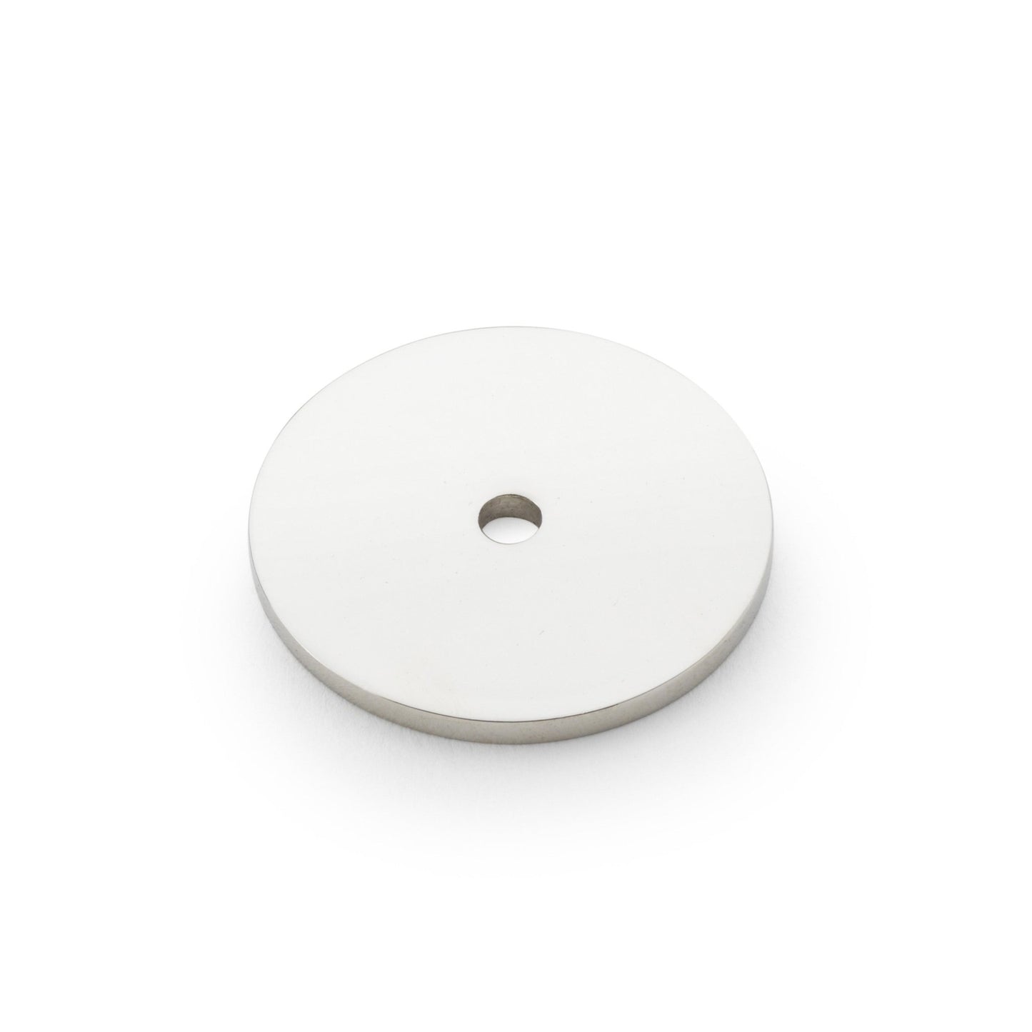 Alexander & Wilks Circular Backplate in a polished silver finish, featuring a flat round shape with a central hole, suitable for mounting applications.