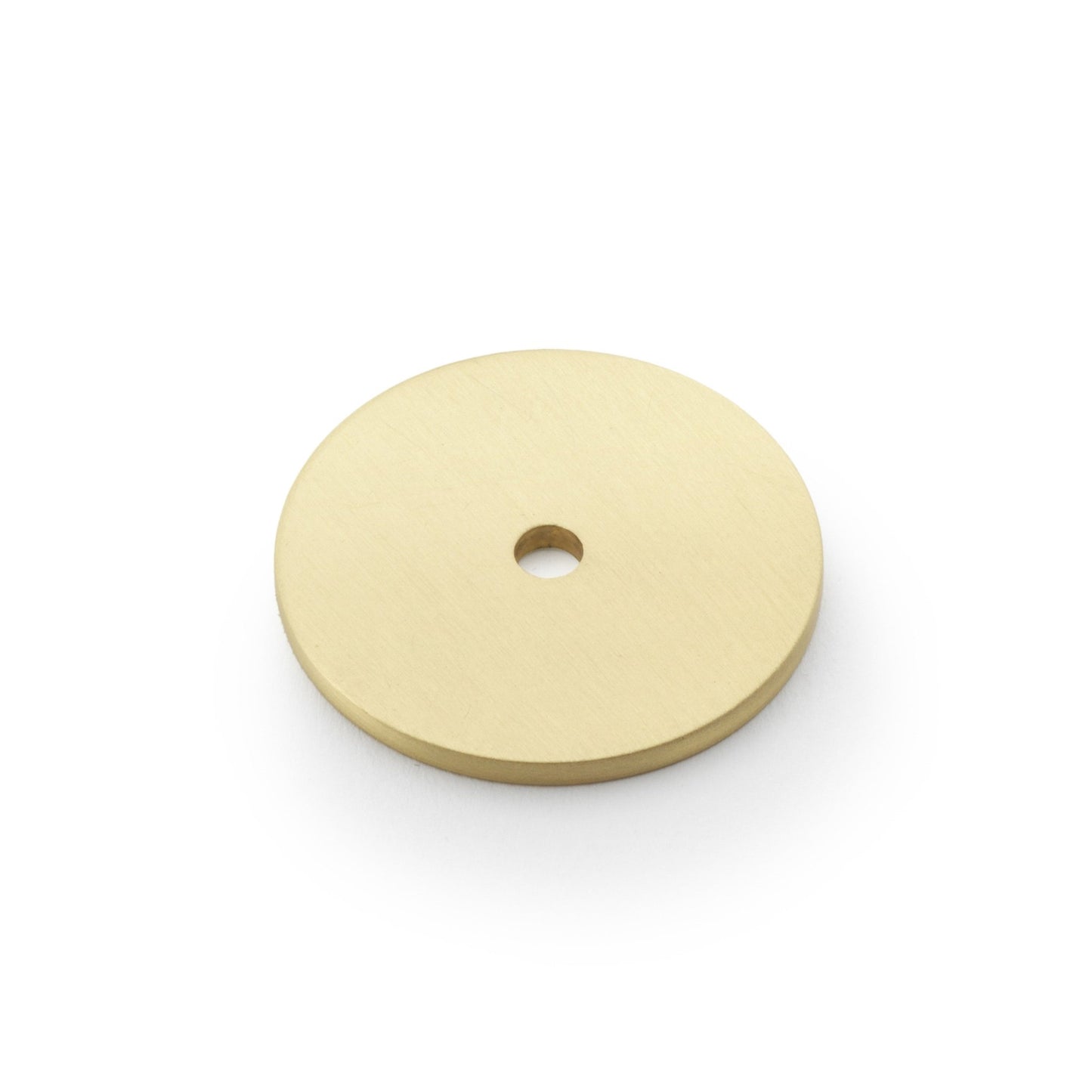 Alexander & Wilks Circular Backplate in a polished brass finish, featuring a round shape with a central hole for mounting.