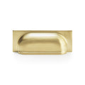 Alexander & Wilks Quantock Cup Handle in a polished brass finish, featuring a deep curved design and a rectangular backplate.