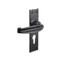 Spira Brass Charlbury Lever Handles in a matte black finish, featuring a curved lever on a textured backplate with a keyhole cutout. The design includes decorative detailing on the edges of the backplate.
