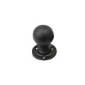 Spira Brass Ball Rim/Mortice Door Knob in black finish, featuring a round ball design with a circular base and four mounting holes.