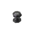 Spira Brass Octagonal Rim/Mortice Door Knob in a dark finish, featuring an octagonal shape with a textured surface and a matching base plate.